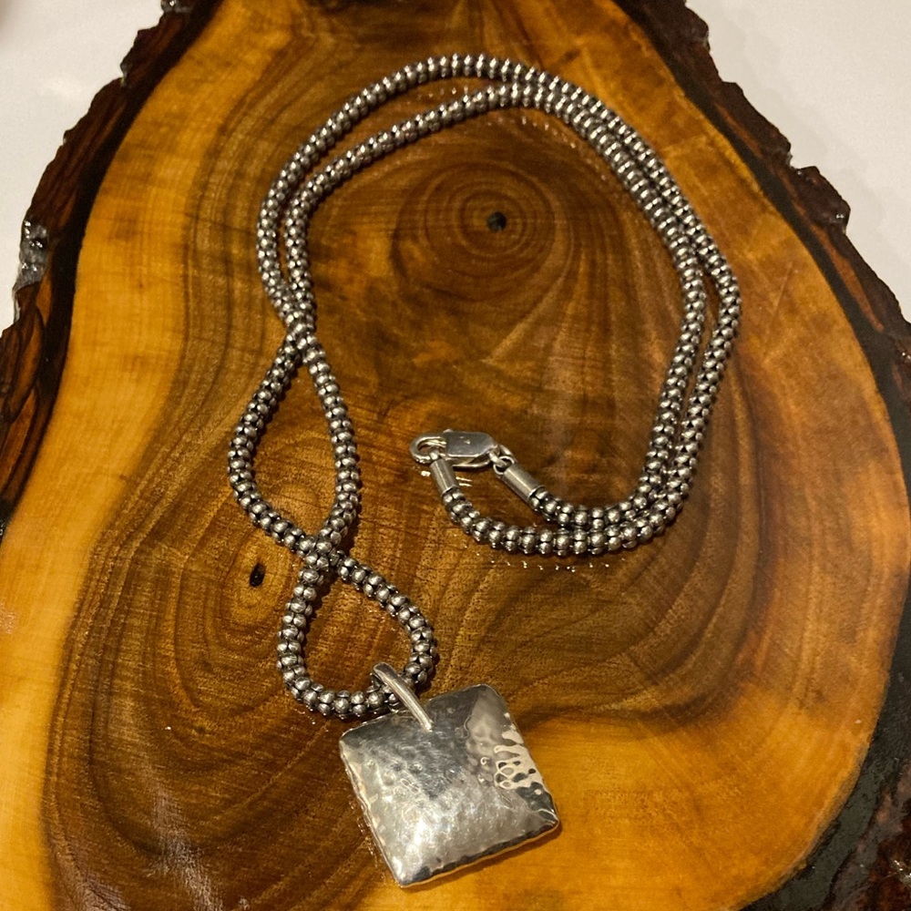 Silpada sterling silver popcorn necklace and hammered silver pendant.